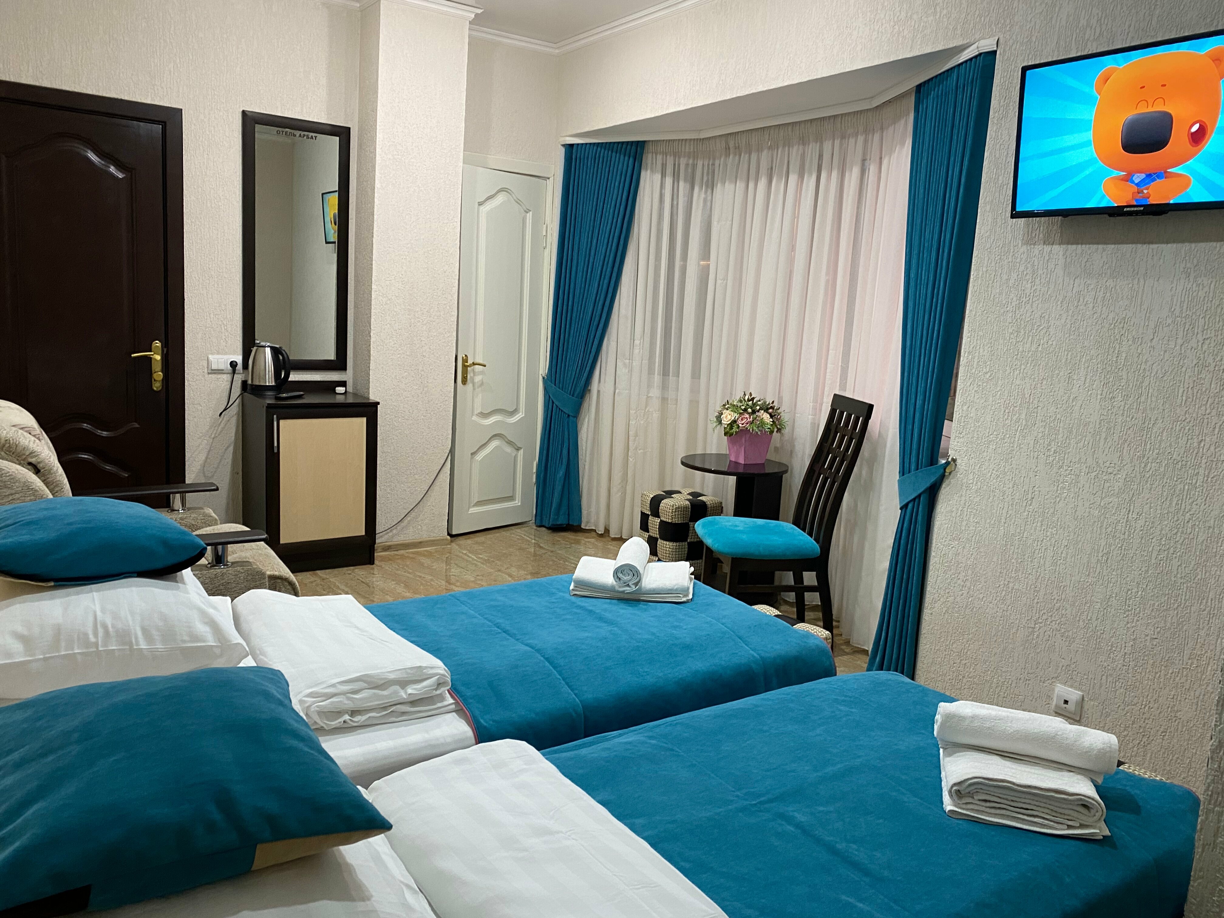 Двухместный номер с 1 кроватью или 2 отдельными кроватями и дополнительной кроватью