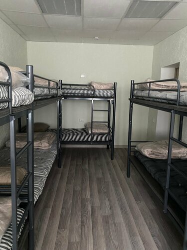 Кровать в общем номере для мужчин и женщин с 10 кроватями в Вахтовик