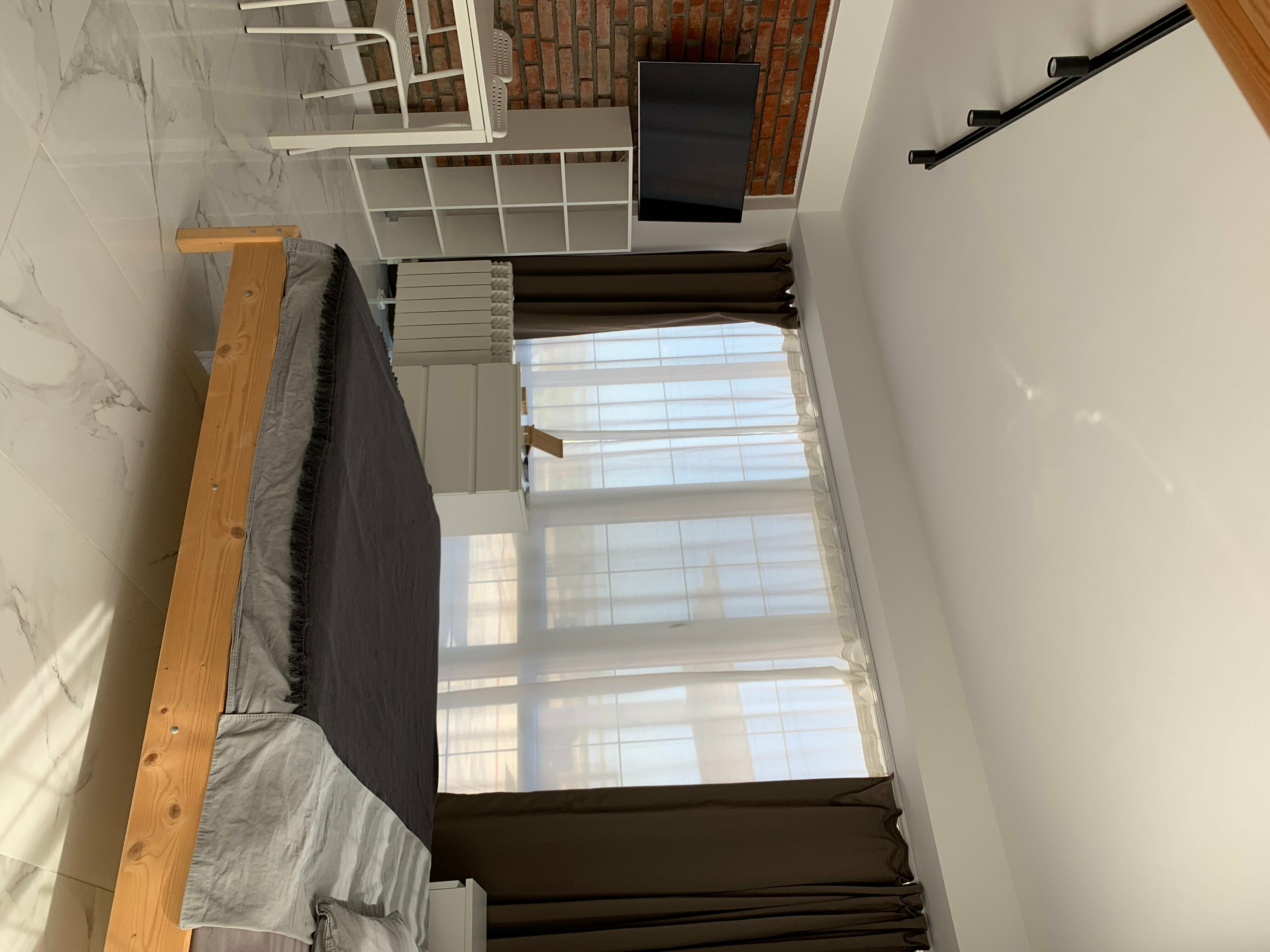 Двухместный номер с двуспальной кроватью и дополнительной кроватью