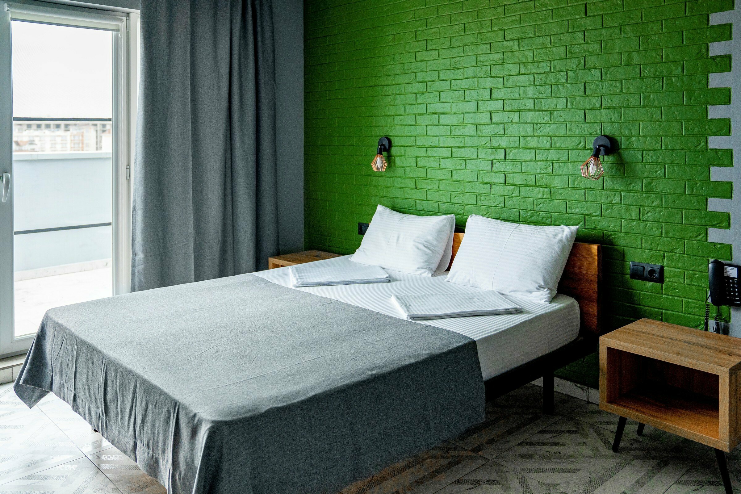 Трехместный номер с балконом