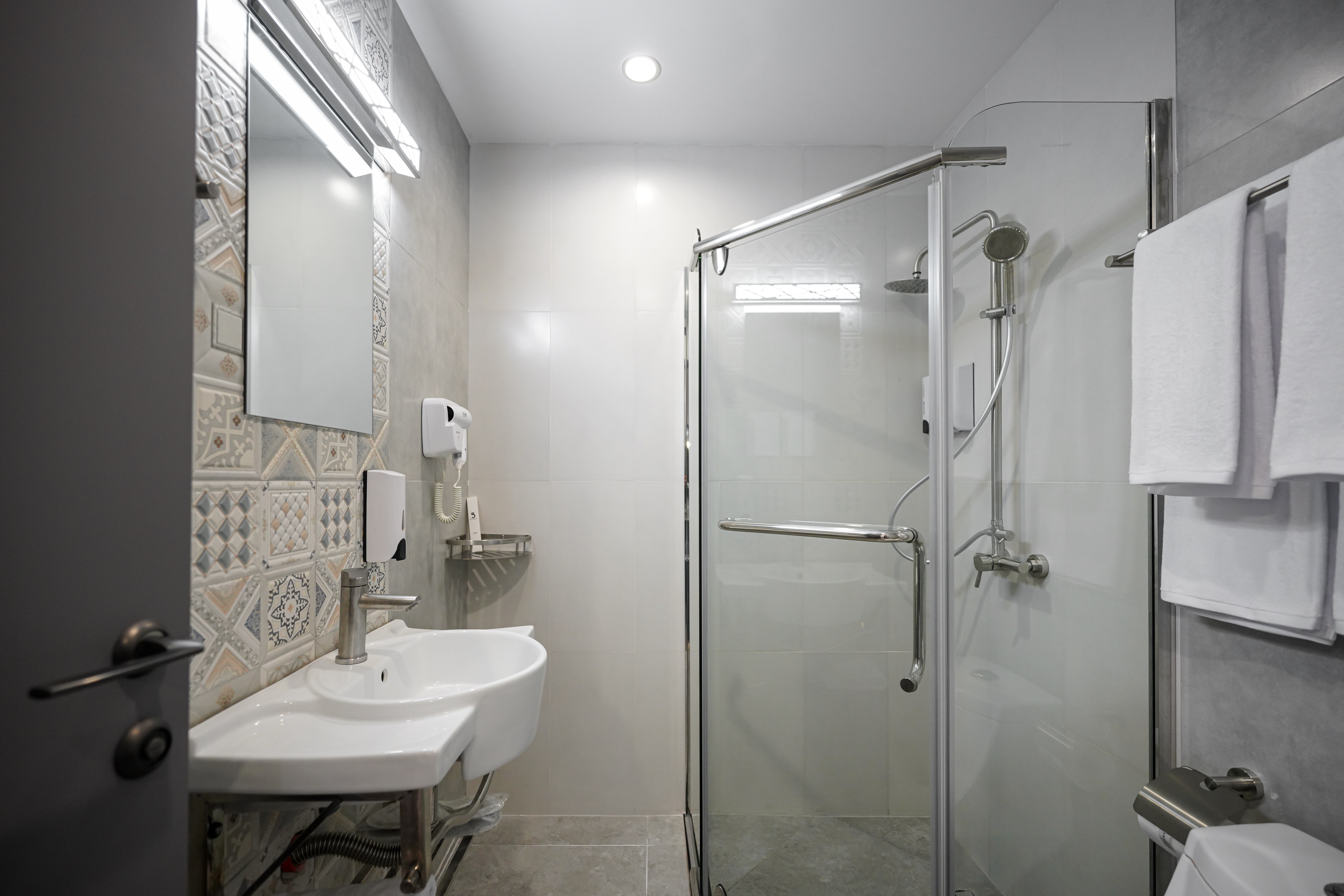 Двухместный номер с двуспальной кроватью и дополнительной кроватью