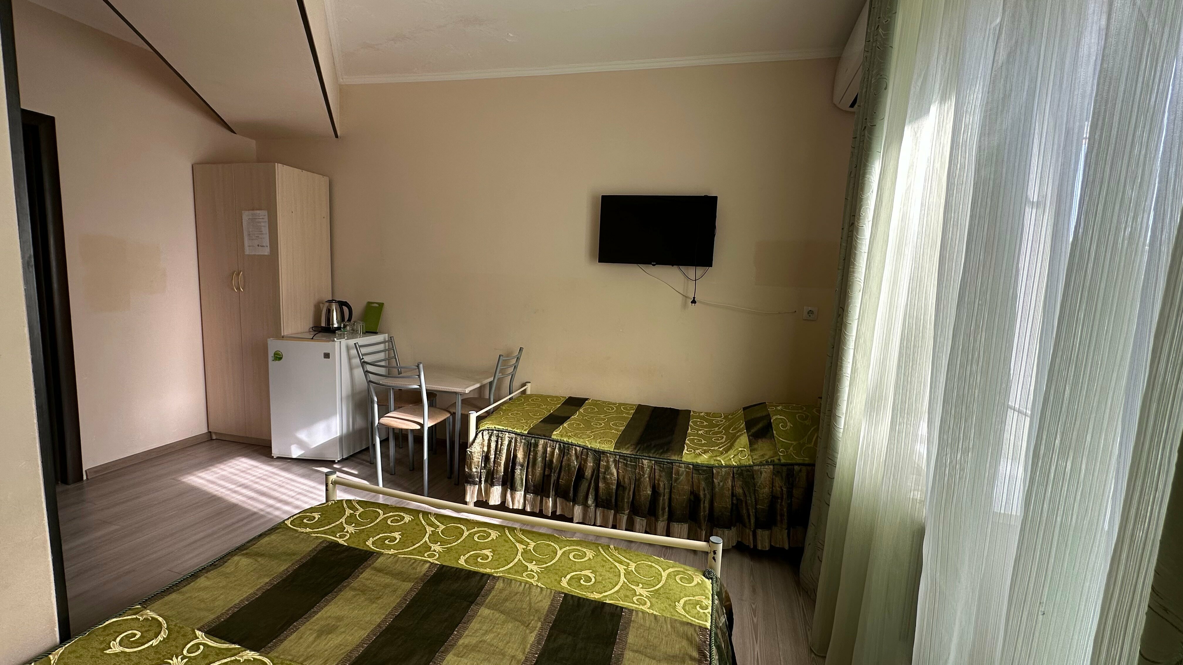 Трехместный номер с балконом