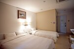 Двухместный номер «Делюкс» с 2 односпальными кроватями в Dong Seoul Hotel