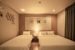 Двухместный номер «Делюкс» с 2 односпальными кроватями в Jeju Stay Hotel