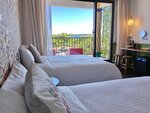 Четырехместный номер, 2 двуспальные кровати, вид на океан в Mini Summer Hostel