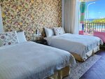 Четырехместный номер, 2 двуспальные кровати, вид на океан в Mini Summer Hostel