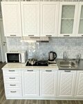 Двухкомнатный номер с кухней в Патрида