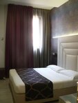 Улучшенный двухместный номер с 1 двуспальной кроватью в Soperga Hotel