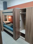 Кровать в общем 4-местном номере для мужчин и женщин в Камин