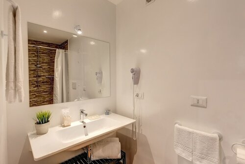 Трехместный номер «Делюкс» в Piccolo Trevi Suites