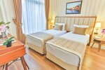 Семейный трехместный номер, Несколько кроватей, для некурящих, отдельная ванная комната в Hanende Hotel