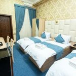 Номер стандарт с 3 односпальными кроватями в Mirzo Boutique Hotel