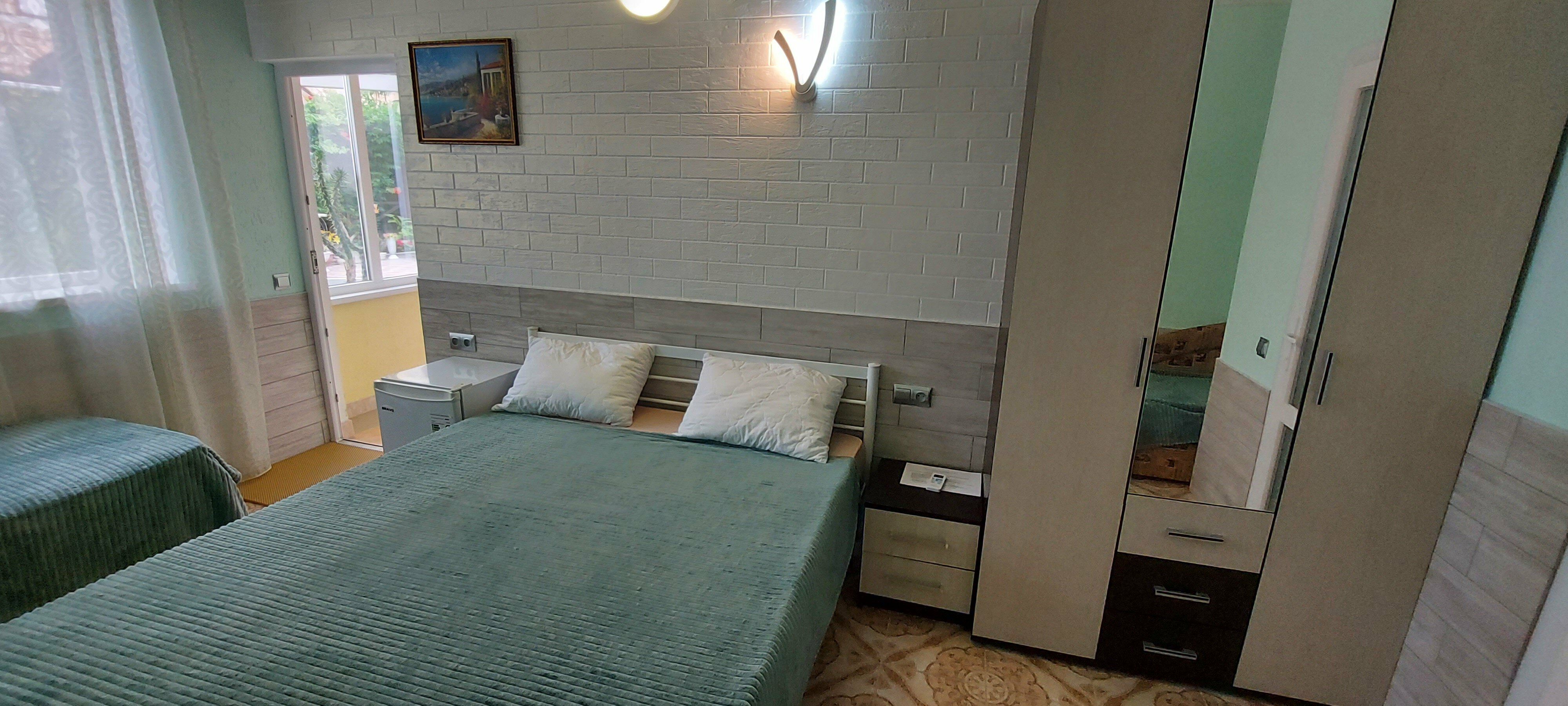 Улучшенный четырехместный номер