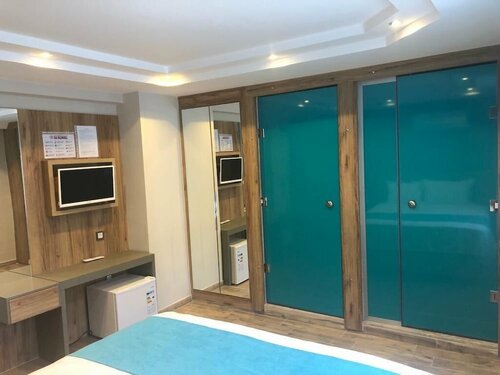 Семейный двухместный номер с 1 двуспальной кроватью в Akcay Mas Palmiye Otel