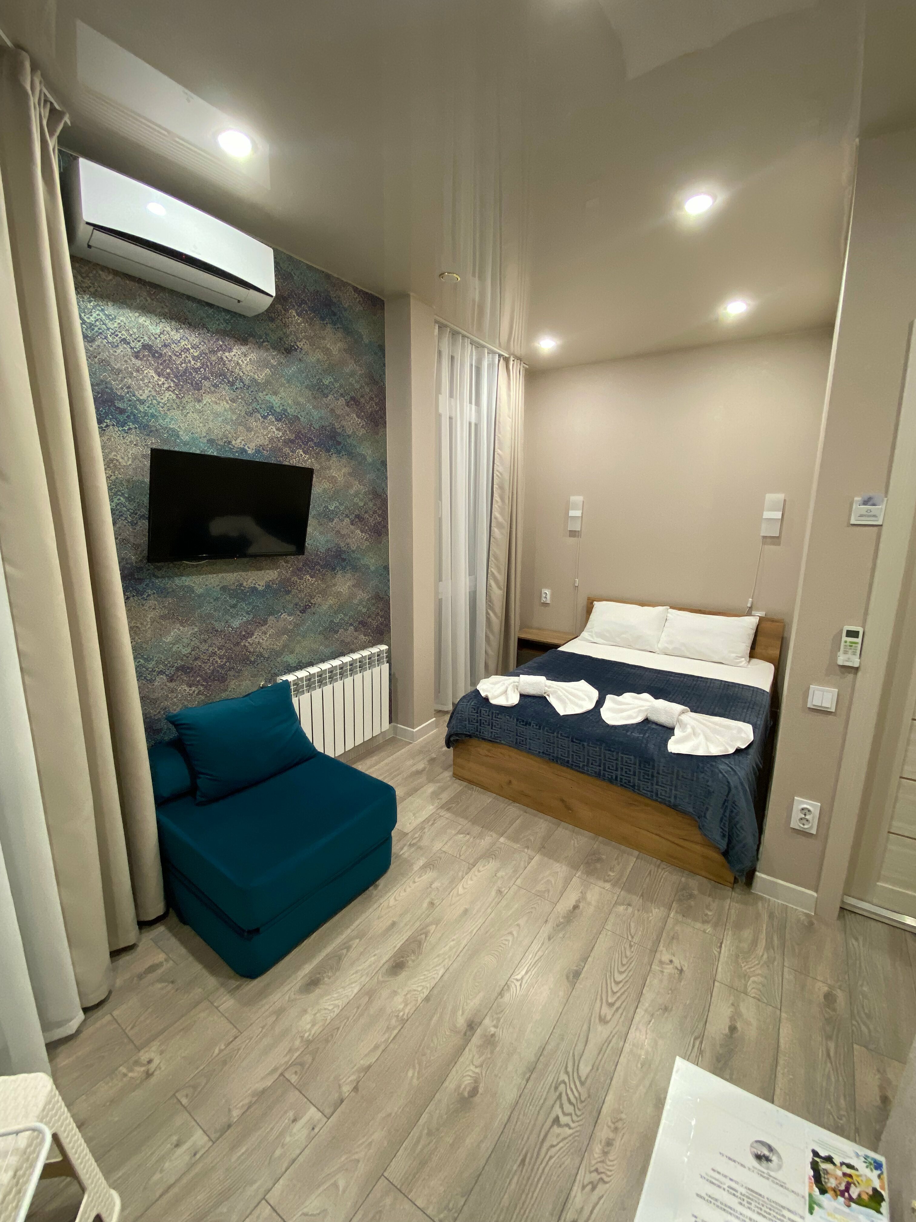 Трехместный номер с балконом