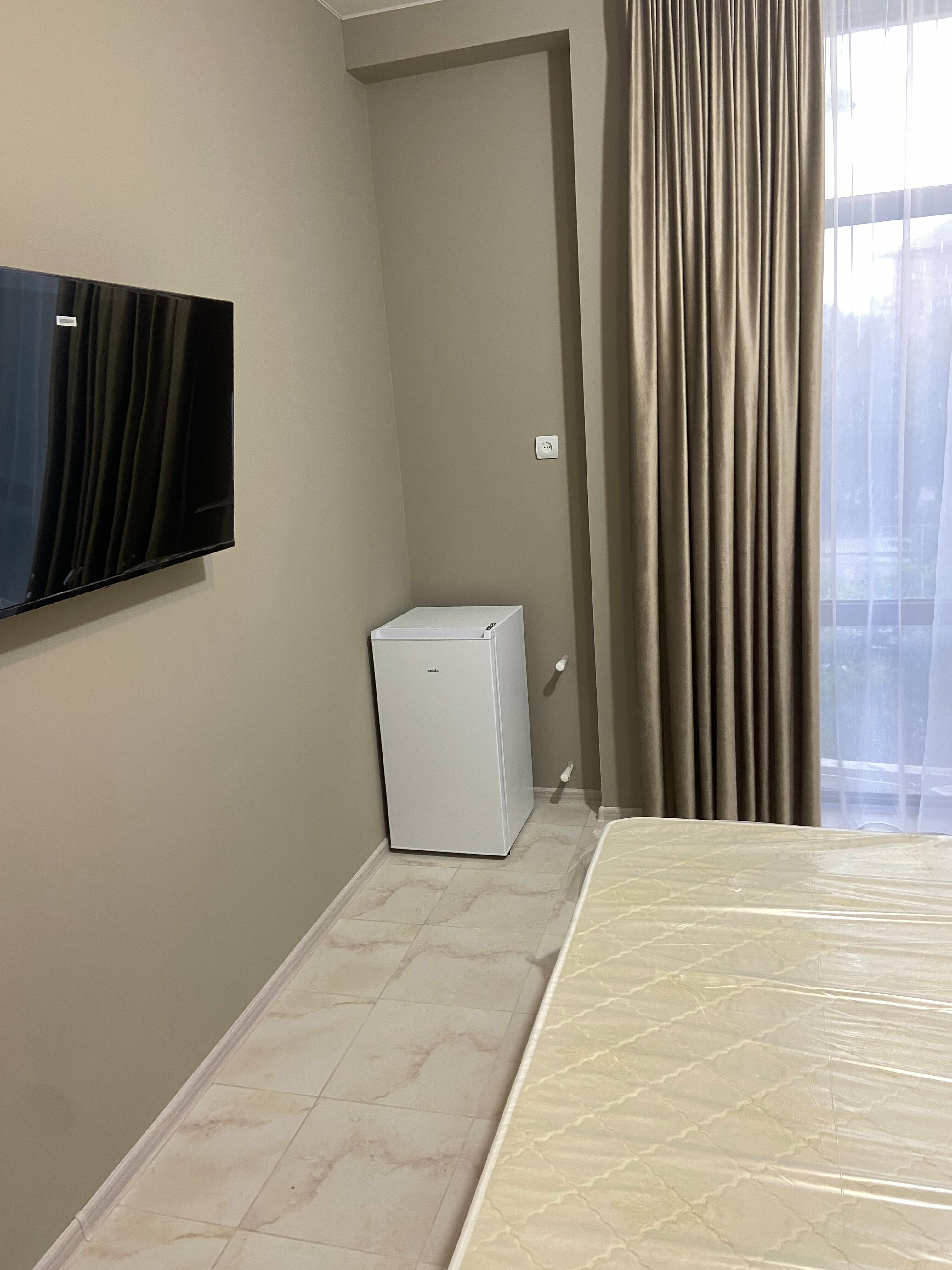 Трехместный номер Делюкс