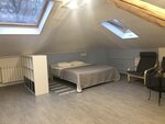 Четырехместный бизнес люкс с большой кроватью и диваном в Norke Варшавская