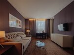 номер ЛЮКС двухкомнатный, с 1 двуспальной кроватью в DoubleTree by Hilton Moscow - Marina Hotel