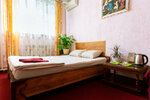 Номер "Комфорт" с одной двуспальной кроватью и удобствами в номере в Славянка