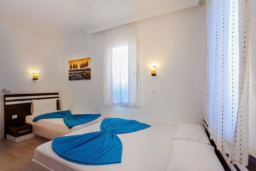 Трёхместный номер Standard двуспальная кровать в Puya Hotel