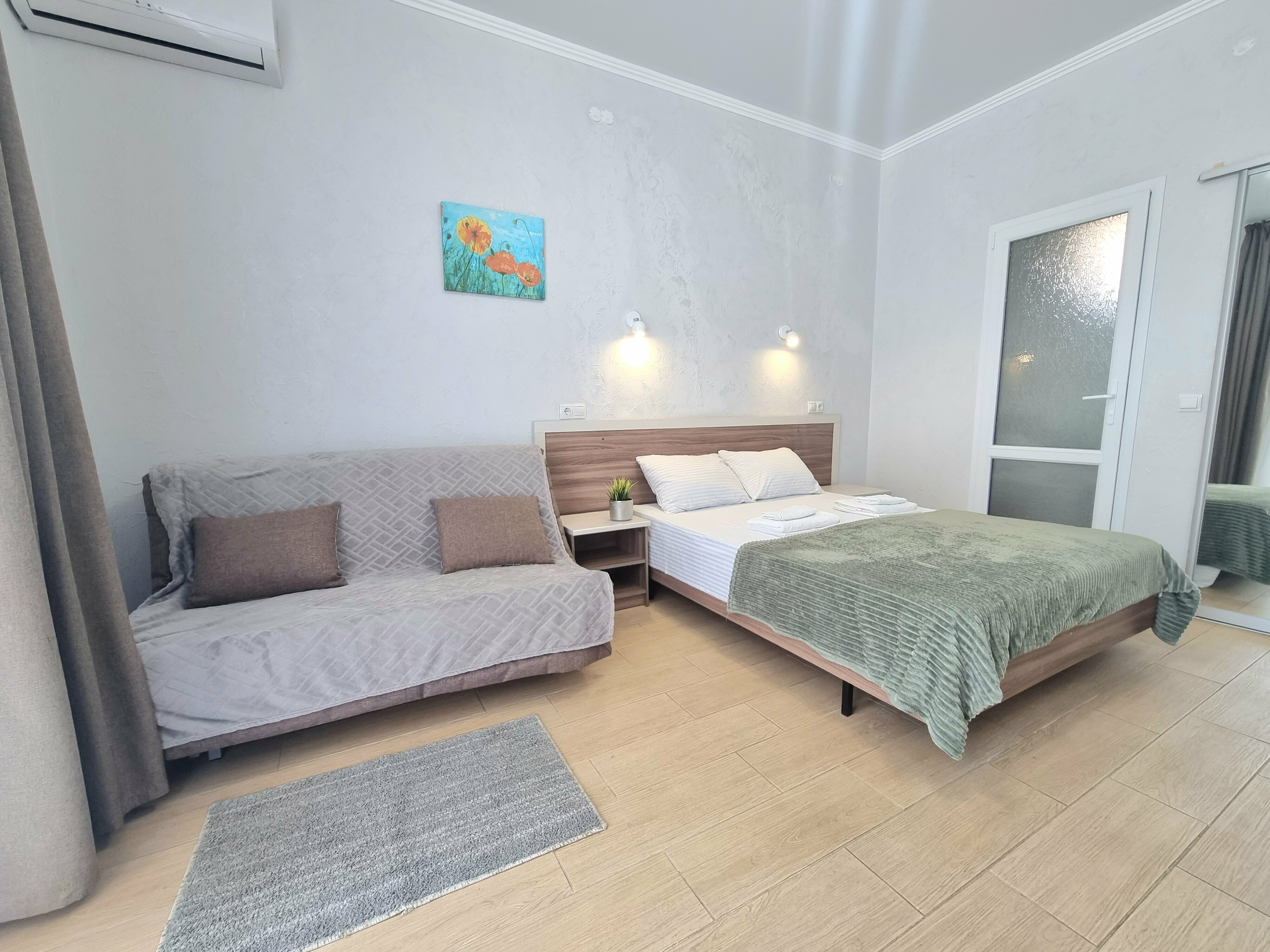 Улучшенный четырехместный номер