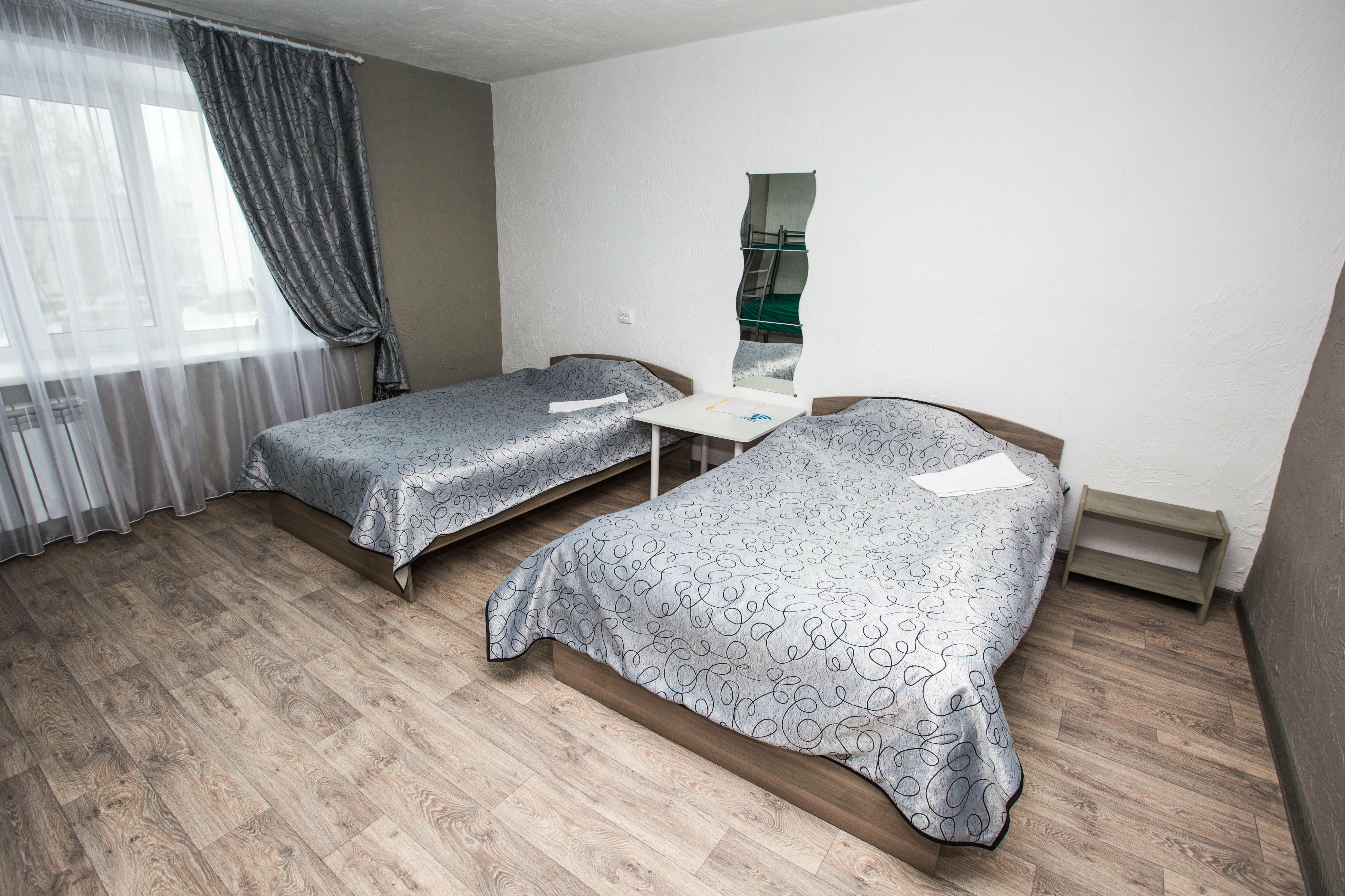 Просторный двухместный номер с 2 отдельными кроватями