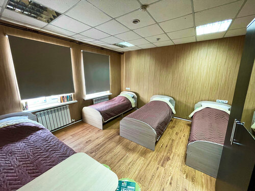 Кровать в общем номере с 4 кроватями в Книжный