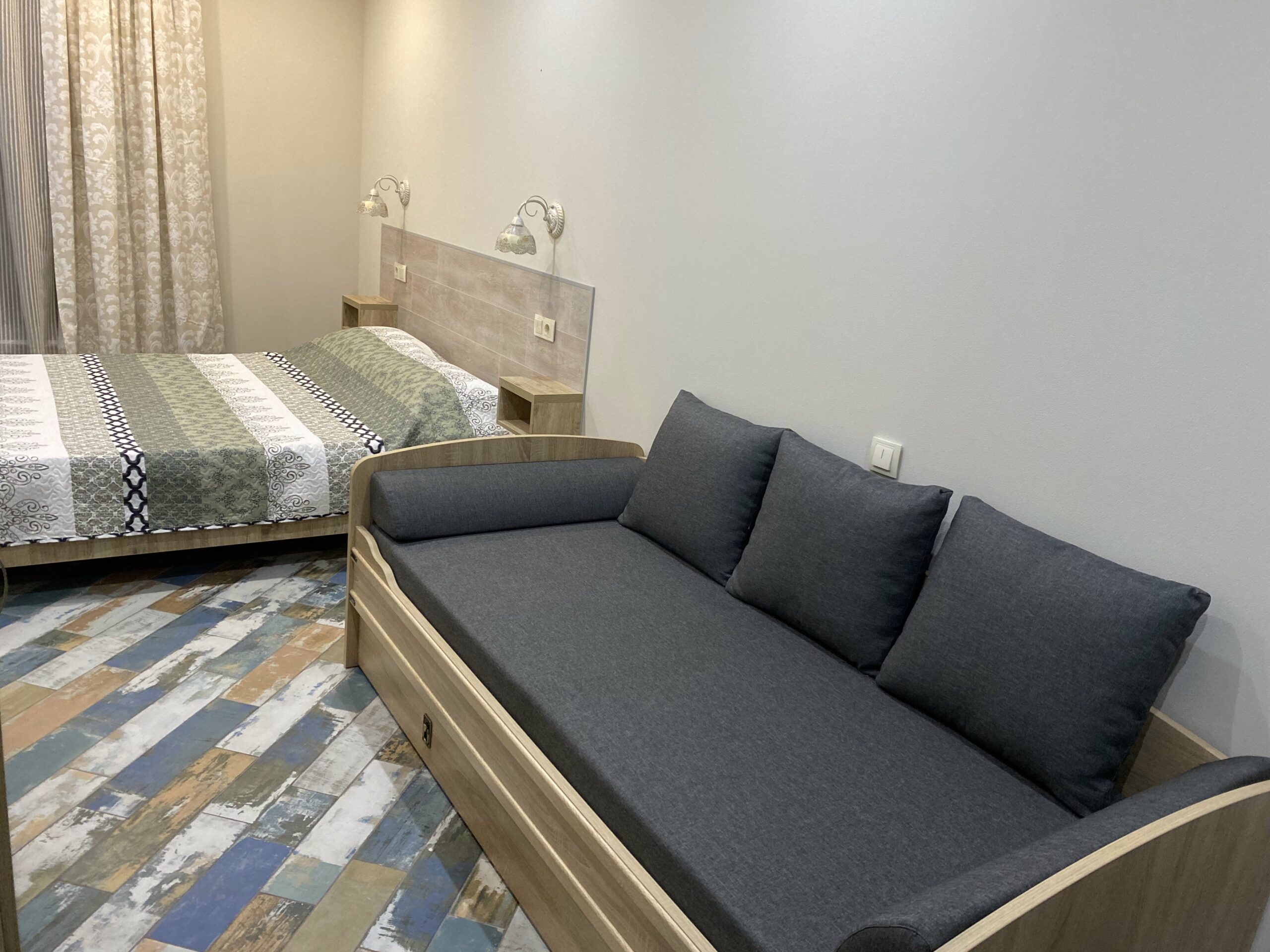 Трехместный номер Делюкс