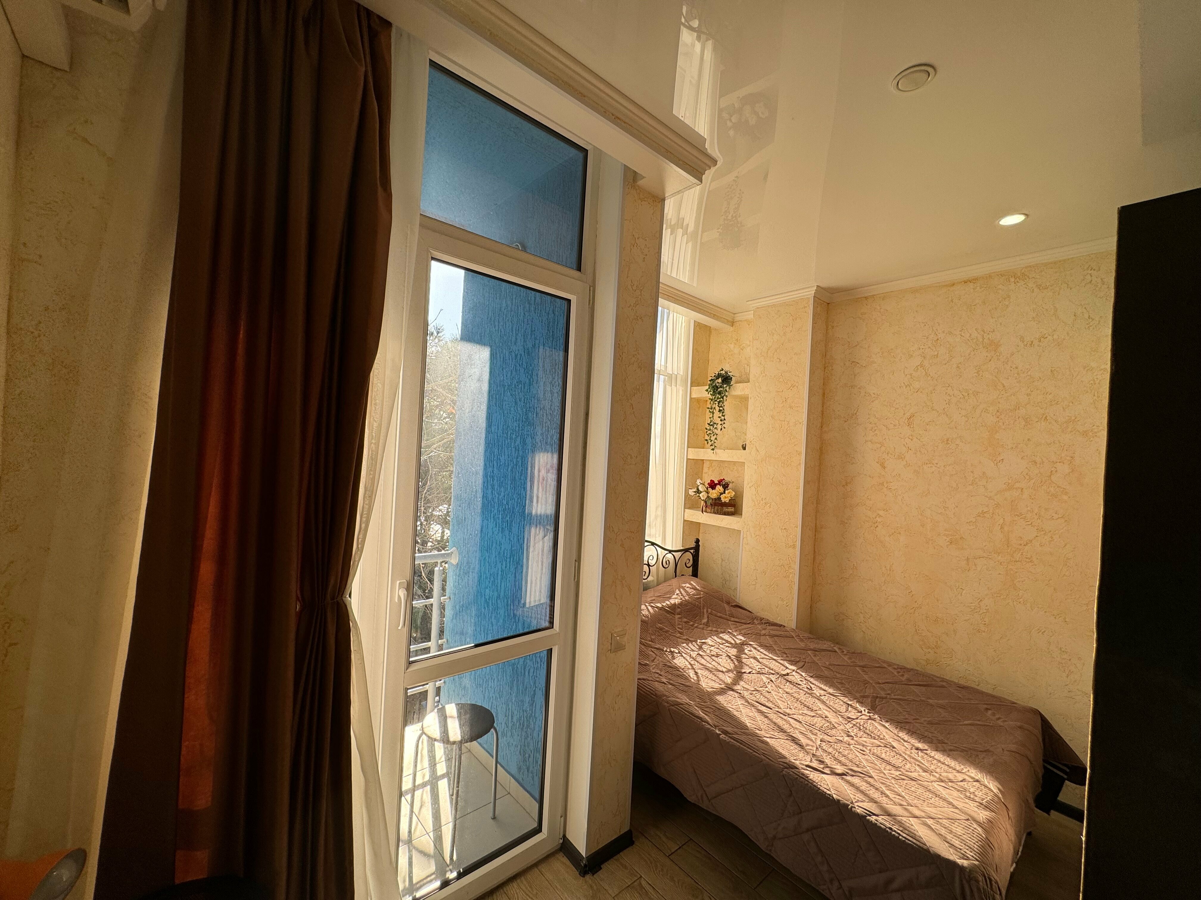 Четырехместный номер с балконом