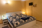 Улучшенный номер с кроватью размера «king-size» или 2 отдельными кроватями в Гостевой дом Марусин луг 18