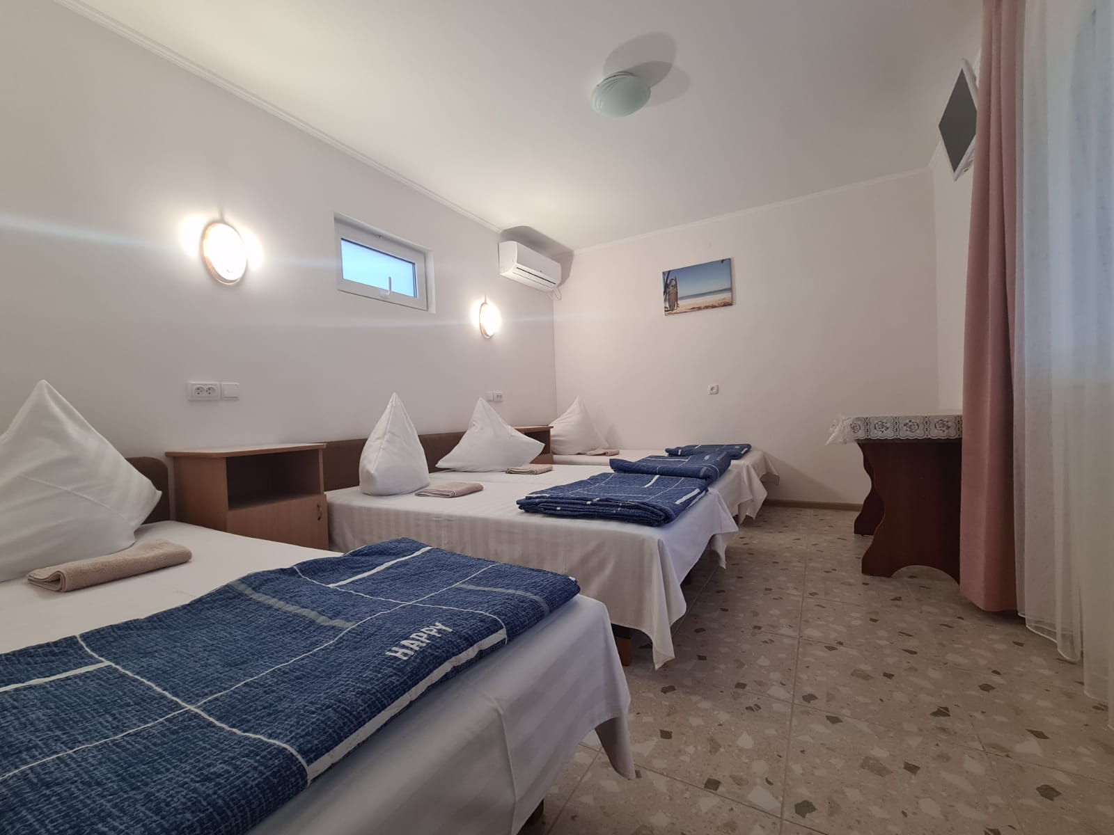 Улучшенный четырехместный номер