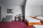 Стандарт с четырьмя односпальными кроватями в Marins Park Hotel Нижний Новгород