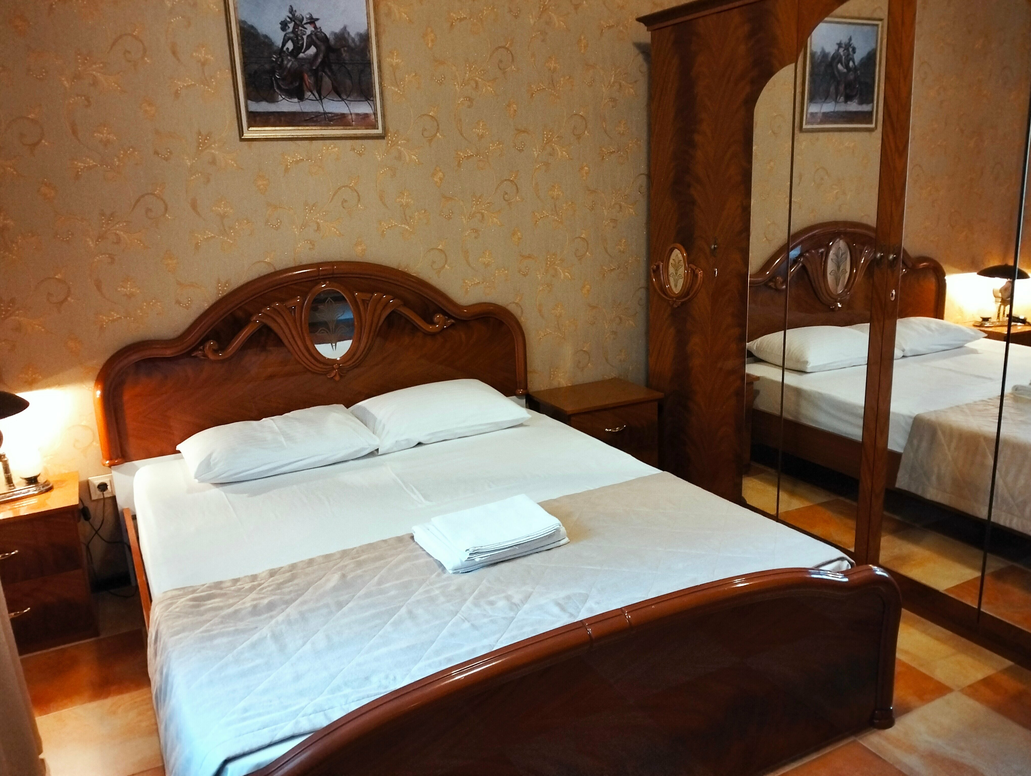 Семейный номер с видом на сад