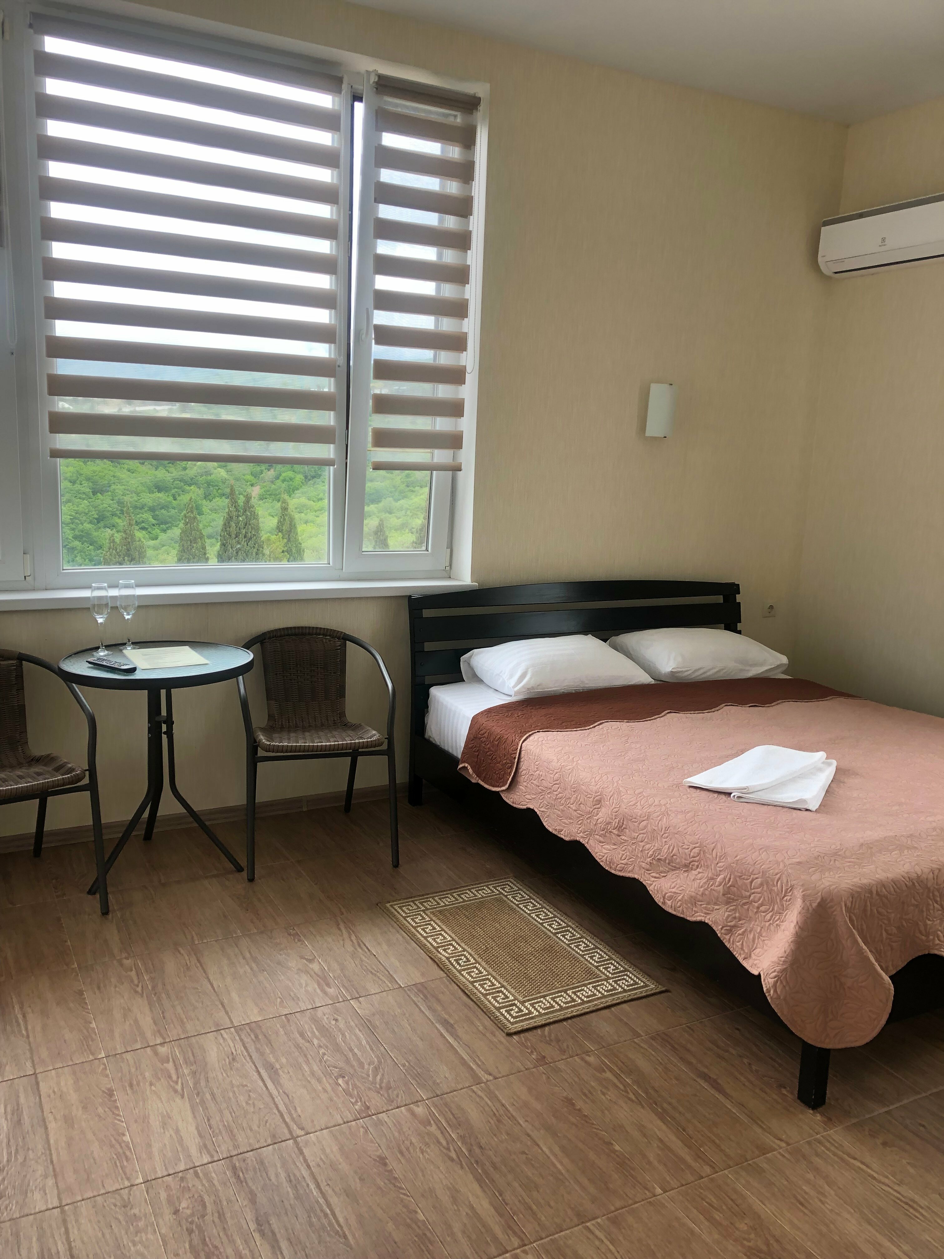 Трехместный номер с балконом