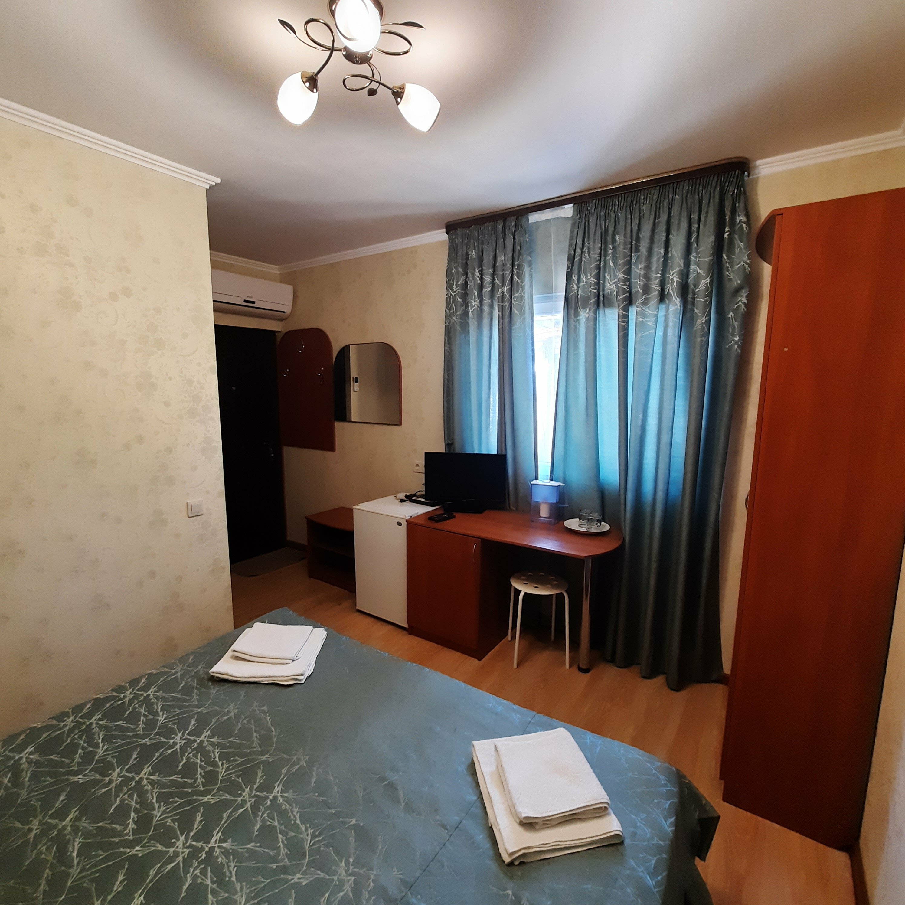 Стандартный двухместный номер с 1 кроватью или 2 отдельными кроватями, вид на сад