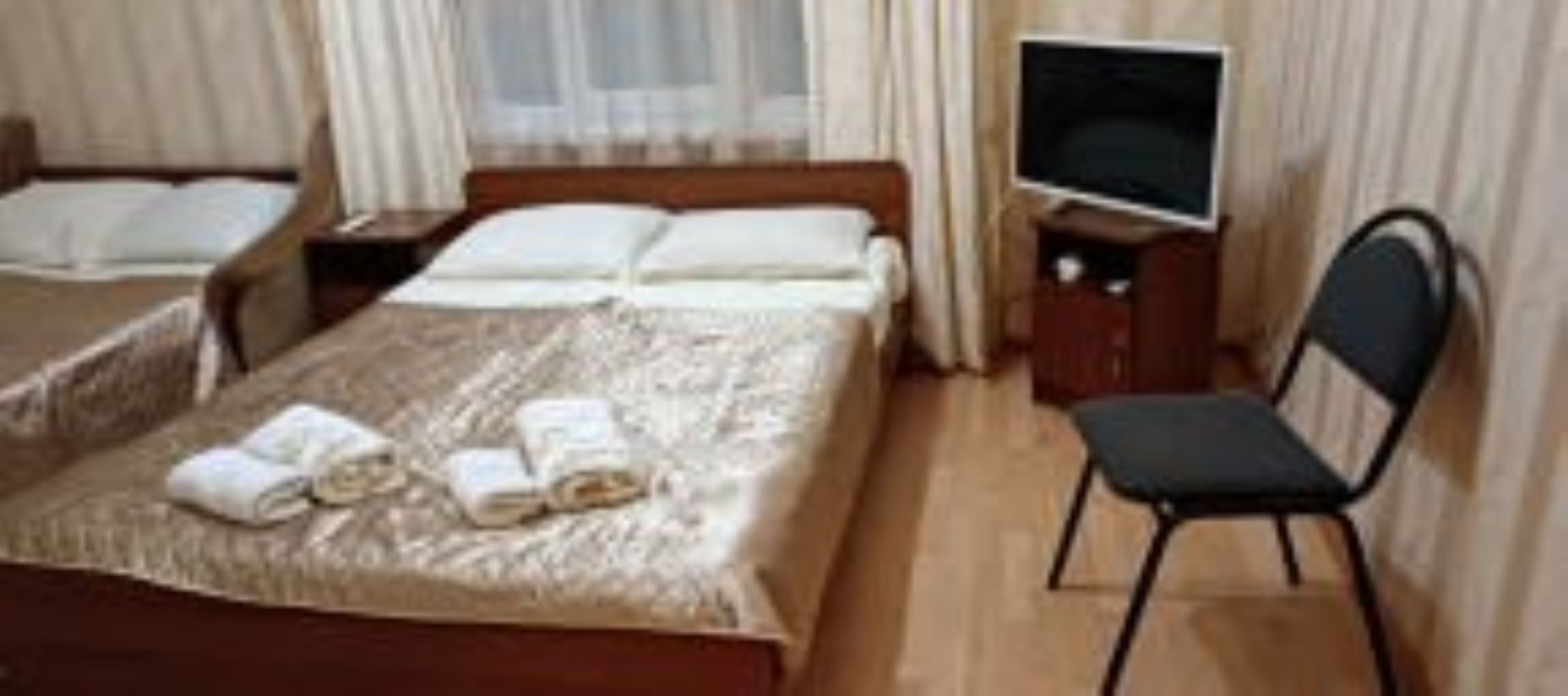 Четырехместный номер с видом на сад