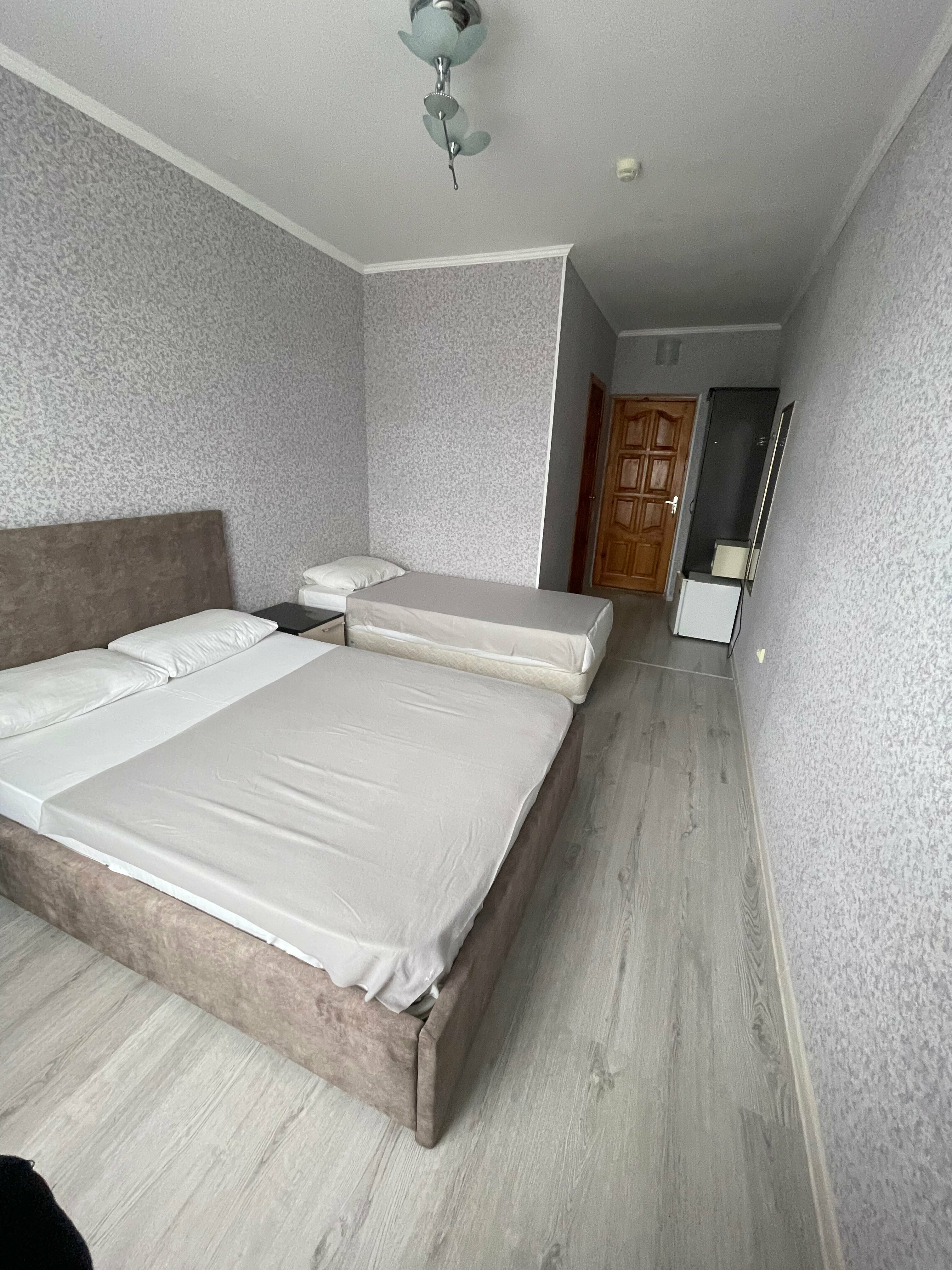 Трехместный номер с балконом