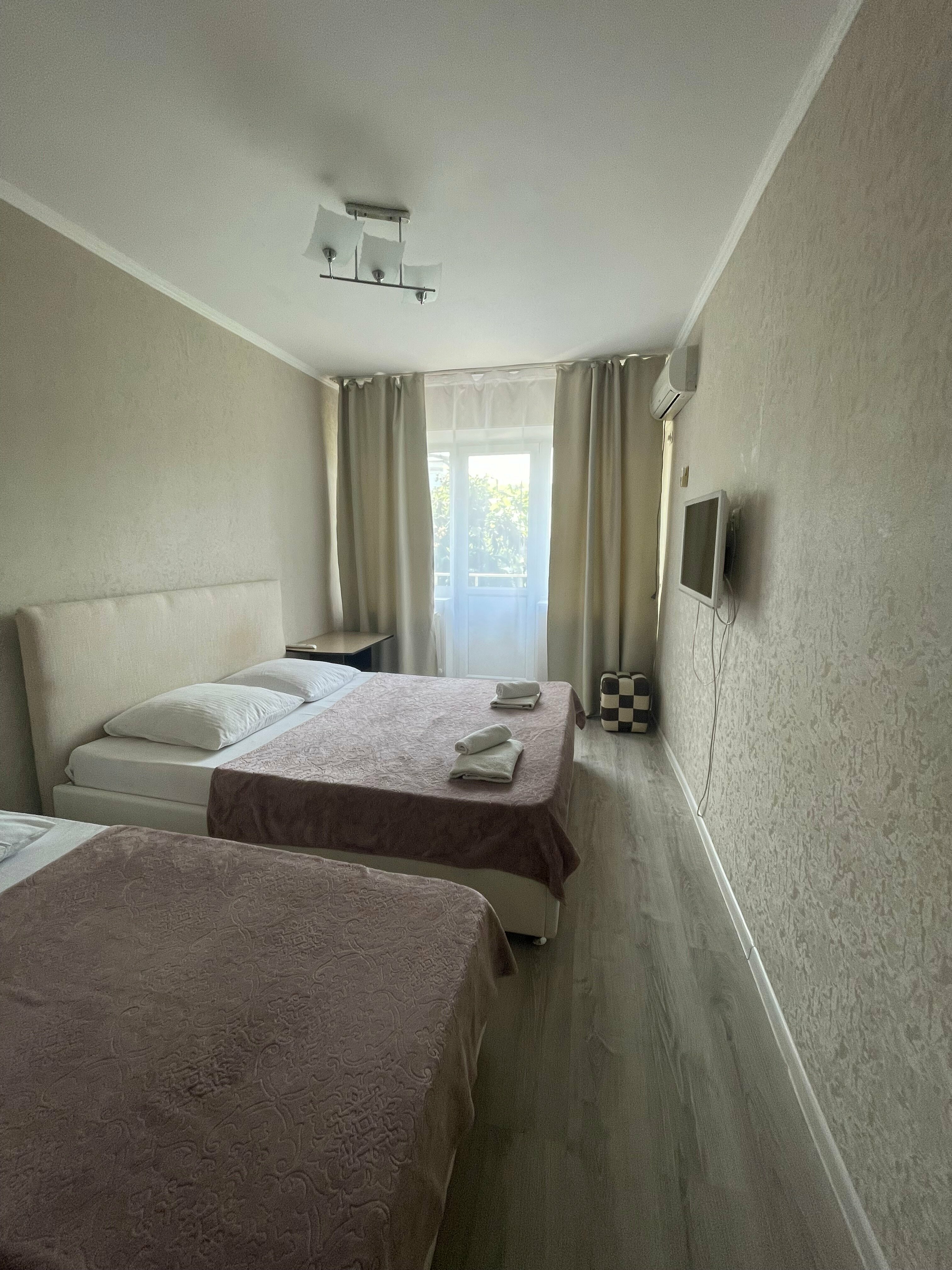 Трехместный номер с балконом