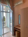 Двухместный номер с 2 отдельными кроватями и балконом в Вилла Дельфин