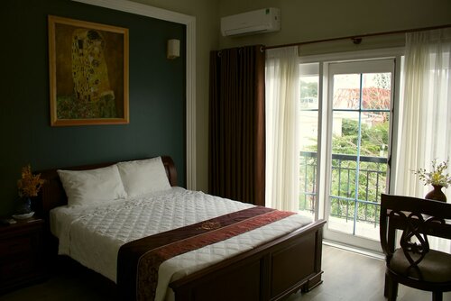 Двухместный номер «Делюкс» с 1 двуспальной кроватью, вид на горы в Ngoc Chau Hotel