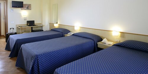 Трехместный номер, вид на сад в Domus Pacis Assisi