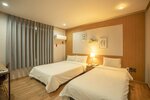 Двухместный номер «Делюкс» с 2 односпальными кроватями в Jeju Stay Hotel