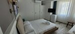 Трехместный номер «Делюкс», вид на город в Tenes Otel