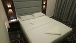 Семейный двухместный номер с 2 односпальными кроватями в Melody Queen Hotel