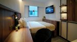 Cabin M, Deluxe, Window, Private Bathroom в St Signature Bugis Middle