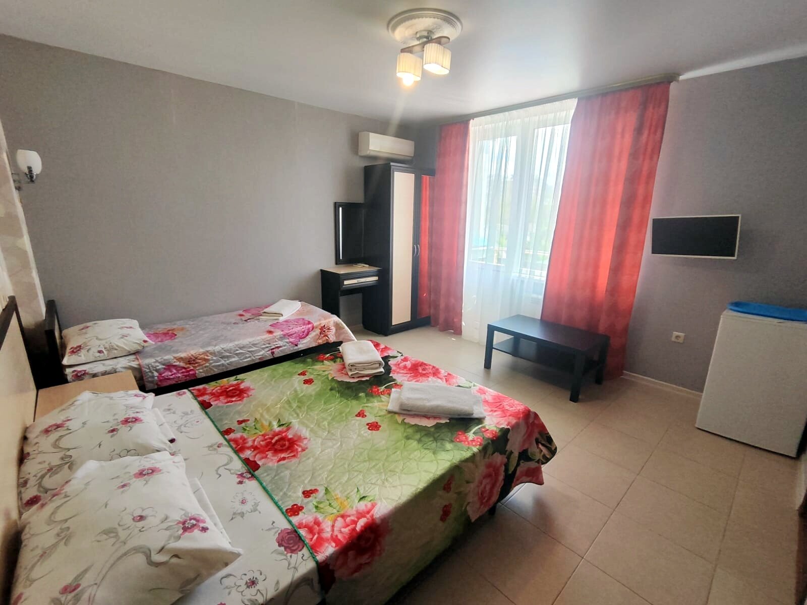 Трехместный номер с балконом