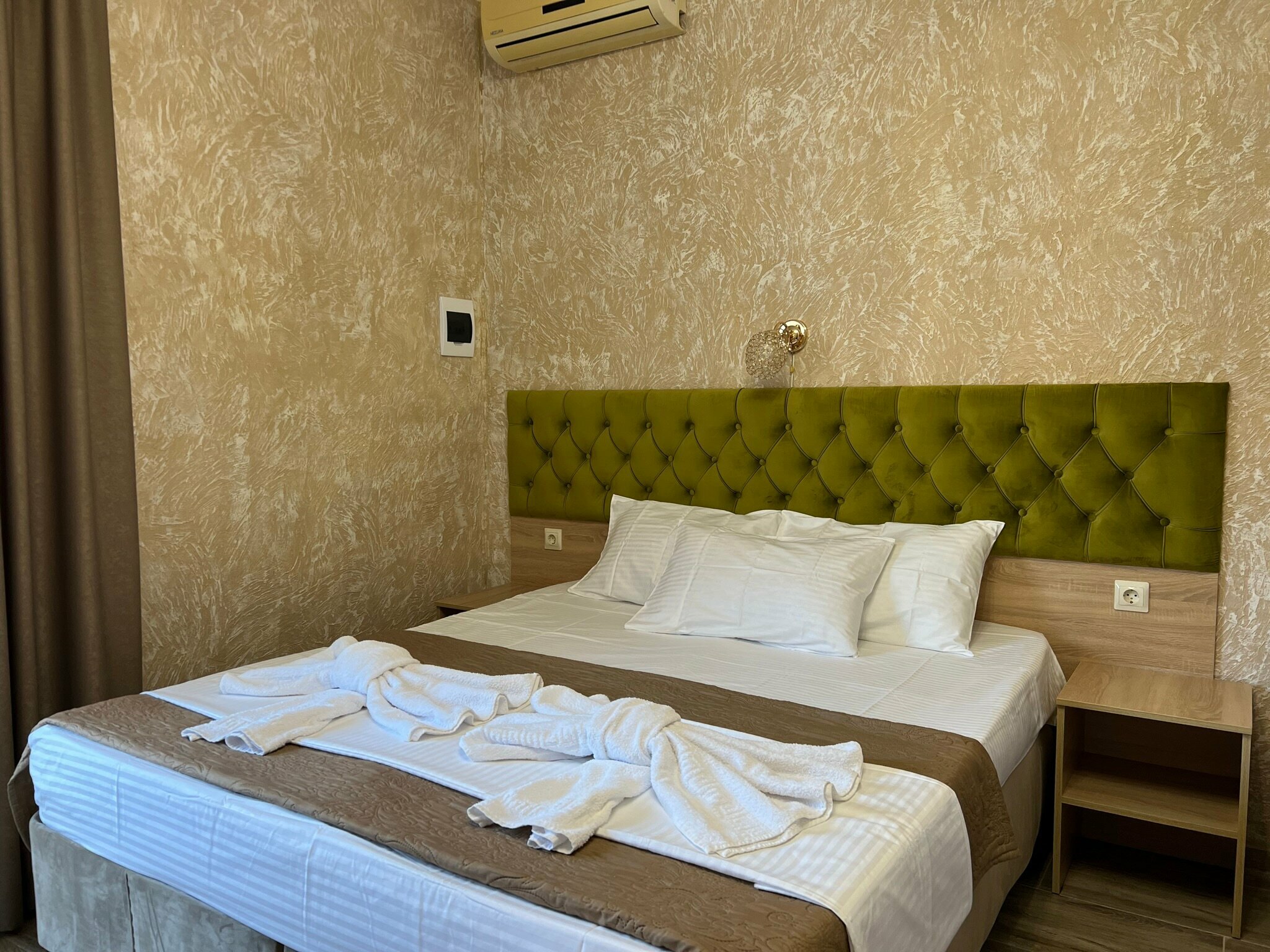 Трехместный номер Делюкс