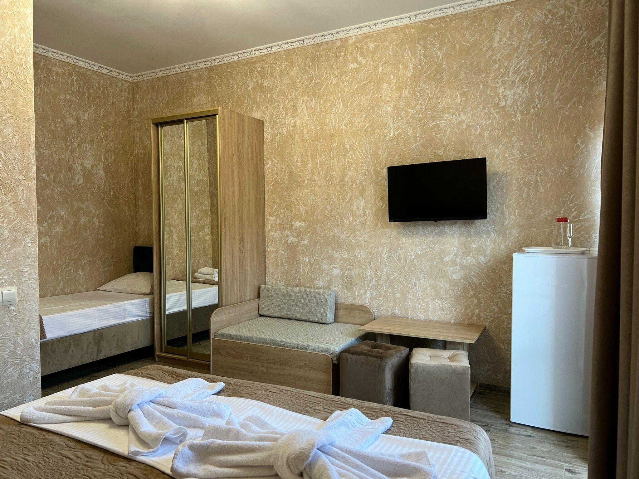 Трехместный номер Делюкс