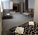 Трехместный номер с двух- и одноместной кроватями и диван-кроватью в Люксембург