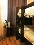 Комфорт двухкомнатный номер с одной двуспальной и двуярусной кроватью с односпальными местами в Почтамтъ